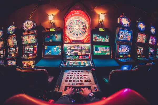 ZBZBET Casino Games — Enjoy nonstop entertainment A close-up shot of golden coins falling around a spinning roulette wheel, representing immersive casino action at ZBZBET.