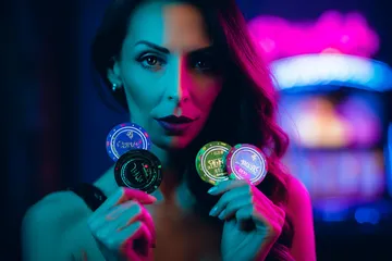 A woman smiling by bright slot machines showing lucky symbols, showcasing the exciting slot offerings at ZBZBET.